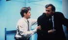 David Duchovny and William B Davis in a scene from The X-Files.