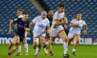 Man of the match Sam Carter makes a key break for Ulster at Murrayfield.