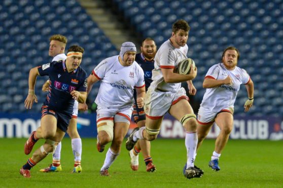 Man of the match Sam Carter makes a key break for Ulster at Murrayfield.