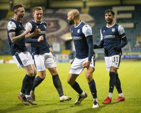 Dundee players celebrate Liam Fontaine's goal against Alloa.