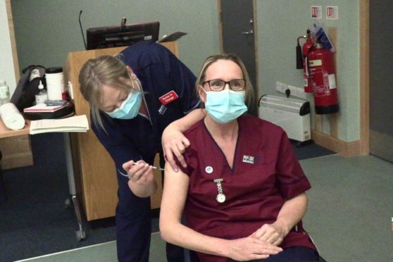 Marie was vaccinated earlier today by colleague, Candice Ross, at the Victoria Hospital in Kirkcaldy.