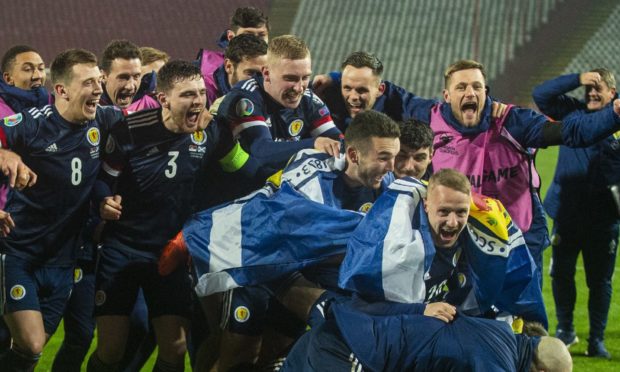 BELGRADE, SERBIA - NOVEMBER 12: Scotland's players celebrate after David Marshall saves Aleksandar Mitrovic's celebration during the UEFA Euro 2020 Qualifier between Serbia and Scotland at the Stadion Rajko Mitic on November 12, 2020, in Belgrade, Serbia. (Photo by Nikola Krstic / SNS Group)