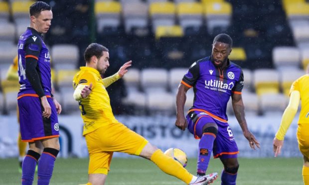 Dundee United midfielder Jeando Fuchs in action against Livingston.