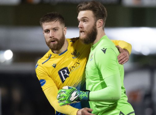 Shaun Rooney and Zander Clark celebrate Saints getting to the semi-final.