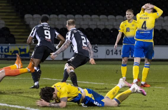 The St Johnstone defenders are disconsolate after St Mirren's late winner.