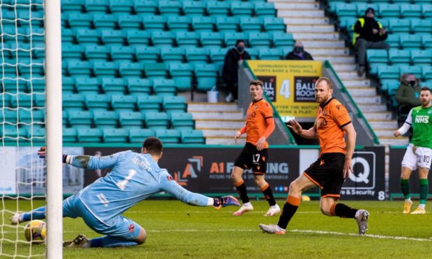 Benji Siegrist saves after the ball deflects off Mark Reynolds.