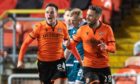 Dundee United strikers Lawrence Shankland and Nicky Clark celebrate their equaliser against Motherwell.