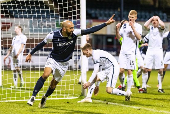 Dundee's Liam Fontaine celebrates after making it 2-1 against Alloa.