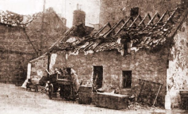 One of the wrecked houses.