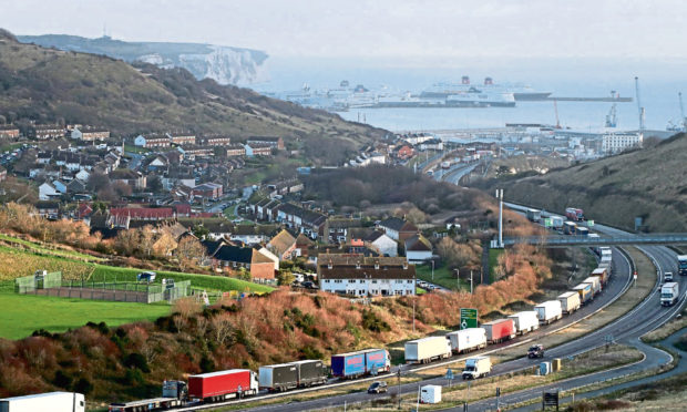 Lorries queue for The Port of Dover along the A20 in Kent as the Dover TAP (Traffic Access Protocol) is implemented due to high volumes of freight traffic.