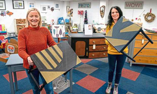 Sarah and Gayle with their upcycled tables.