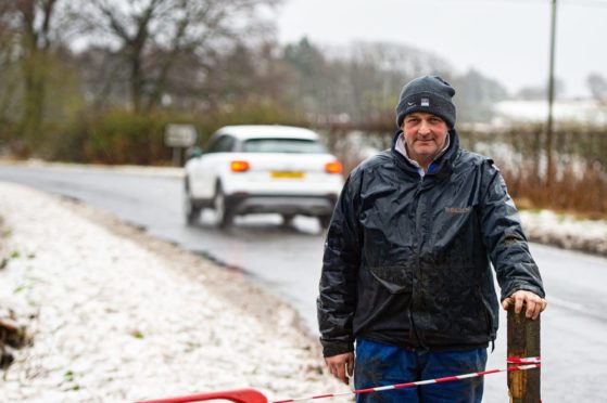 Farmer Andrew Wilson is urging councillor to push for the stretch of A916 to be made safer.