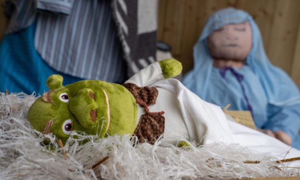 Villagers were surprised to find Shrek at the centre of their nativity scene.