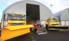 Some of the vehicles in Fife's winter fleet this year outside the region's giant salt barns.