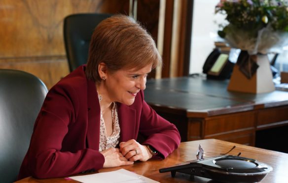 First Minister Nicola Sturgeon makes a 'kindness call' to Chris Smith and Freya Riley from Fife to back Chest, Heart and Stroke Scotland's Christmas loneliness campaign.