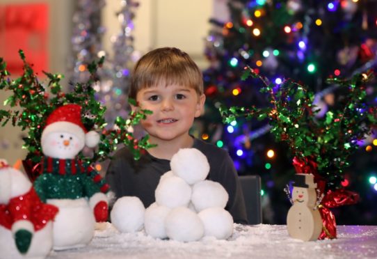 Cole Rafferty, 4, was making snowballs on his visit to the centre.