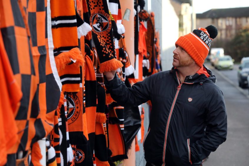 A number of scarves were left by fans.