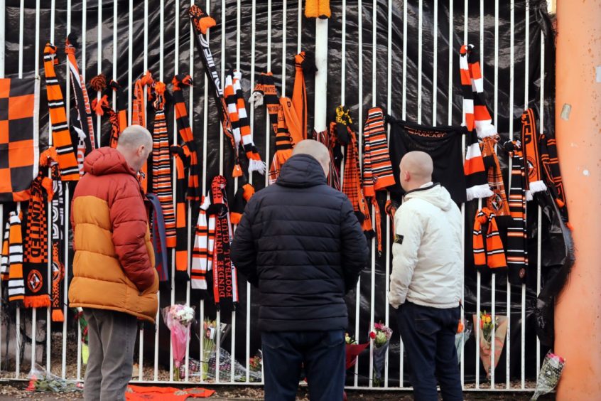 Fans gathering yesterday to pay their respects.