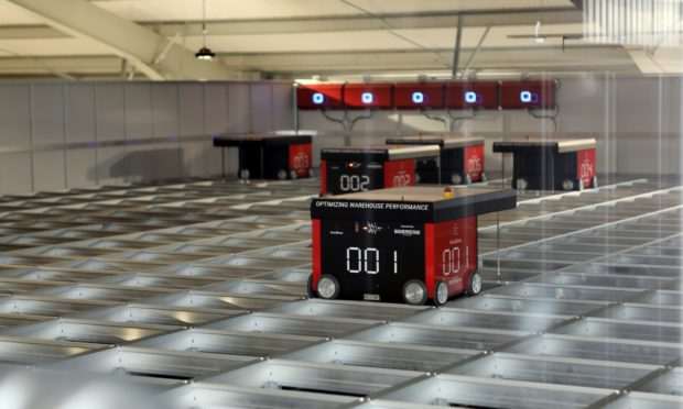 The robots at work in the Direct Soccer facility.