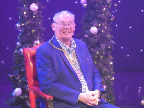 Provost Jim Leishman helping to promote the Alhambra Theatre's Christmas production.