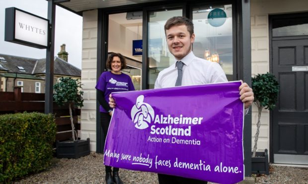 Harrison Whyte of Whytes of Monifieth and Rosemary Moncur of Alzheimer Scotland.