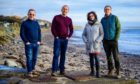 Largo Arts directors Dougi McMillan and Andrew Stenson with Carol and Andy Duff on the beach at Lower Largo. Image credit dougimcmillanphotography.com.