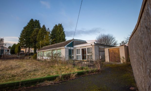 Derelict former Scone Bowling Club and grounds will not be demolished to make way for homes.