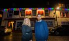 Anna Turnbull (bar manager) and owner Louis Finch outside the Alyth Hotel.