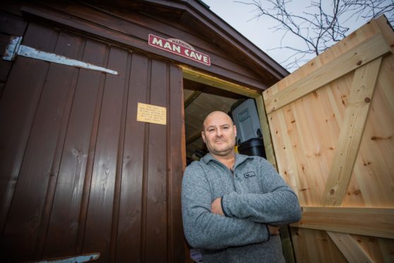 Paul Wilkie with his new shed.