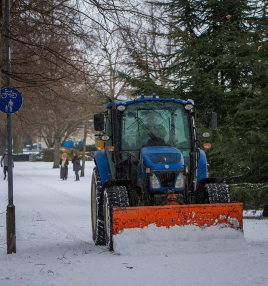 A tractor clearing paths on the South Inch, Perth on Wednesday, February 28 2018.