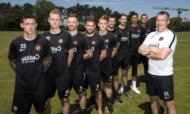 Former Dundee United manager Csaba Laszlo with most of his signings from the summer of 2018. From left - Fraser Aird, Christoph Rabitsch, Craig Curran, Nicky Clark, Sam Wardrop, Callum Booth, Frederic Frans, Benjamin Siegrist and Matej Rakovan.