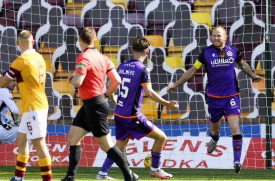 Mark Reynolds, right, after scoring against Motherwell.