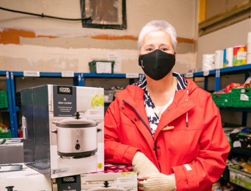 Linda Millar dropped off dozens of slow cookers at Perth Foodbank last week.