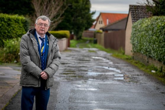 Council co-leader David Alexander up at a road off Balcurvie Road which has been wrongly used by sat nav drivers and now lorries have caused a bit of damage.