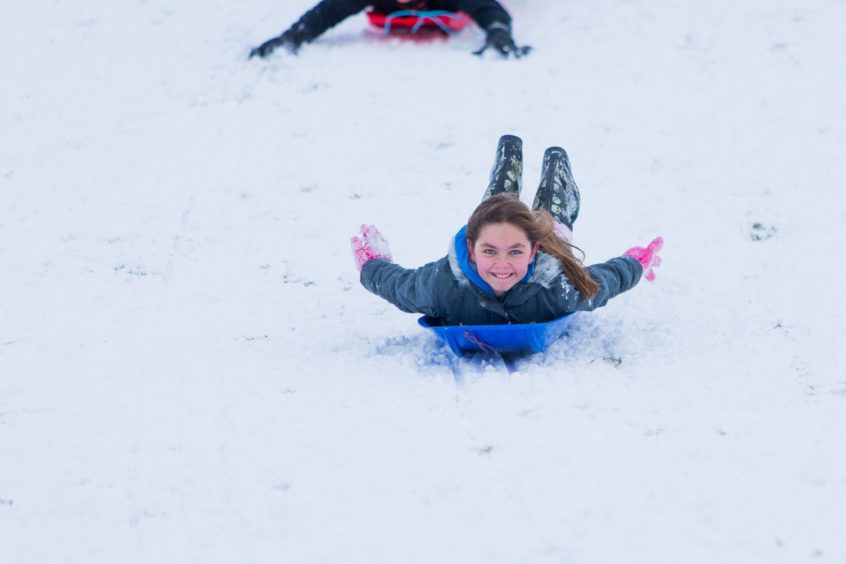Sledging at Riverside Park, Glenrothes. Natasha Turnbull (11) enjoying the snow in February 2018.