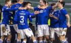 The St Johnstone players celebrate their opening goal from Chris Kane.