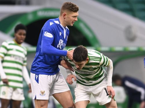 Liam Gordon gets to grips with Ryan Christie.