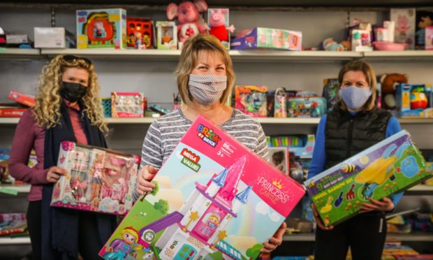 ANGUS TOY APPEAL: Sharon Spink (centre) with volunteers at the Arbroath-based charity.