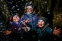 The kids went wild for the snow, l to r, Lucy Rodger, 8, Melody Smith, 7, and Murray Rodger, 6.
