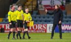 Hearts boss Robbie Neilson remonstrates with referee Don Robertson at full-time.