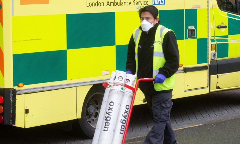 Mandatory Credit: Photo by Mark Thomas/Shutterstock (11704162k)
Oxygen delivery.
Lines of ambulances and a steady stream of patients arriving at the Royal London Hospital. The Covid-19 virus is putting the staff and hospitals under severe pressure.
Royal London Hospital, Royal London Hospital, London, UK - 12 Jan 2021