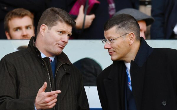 SRU chief operating officer Dominic McKay (L) with SPFL chief Neil Doncaster at 2018 Betfred Cup semi-final between Hearts and Celtic at Murrayfield.