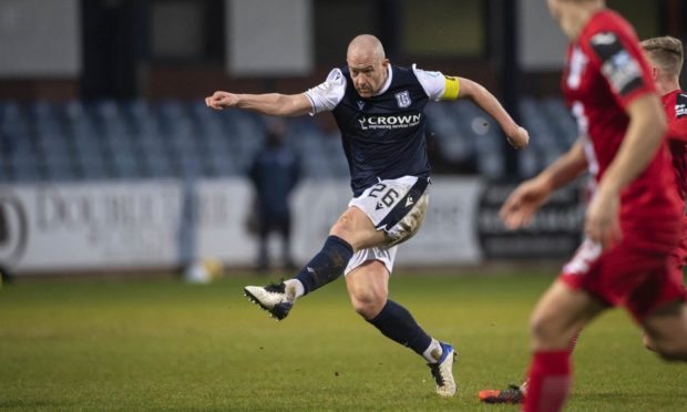 Dundee's Charlie Adam scores the opening goal against Dunfermline.