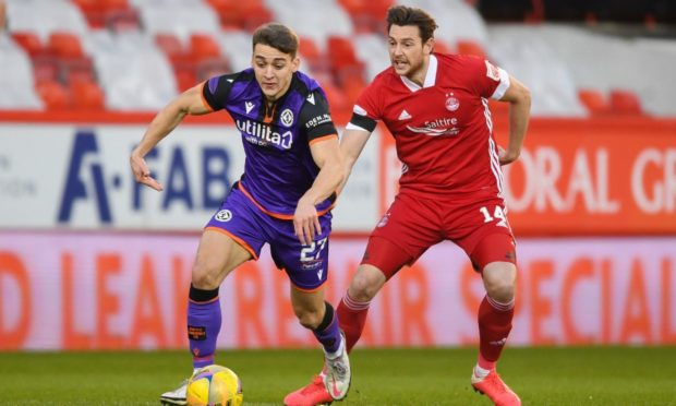 Dundee United forward Louis Appere takes on Aberdeen's Ash Taylor on Saturday.