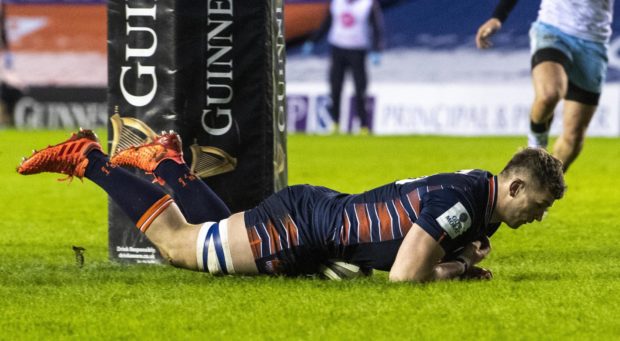 Magnus Bradbury gets downward pressure - just - to score Edinburgh's crucial try.