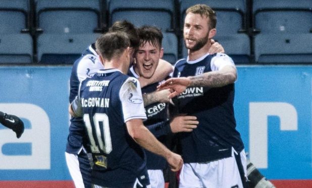 Dundee players celebrate after Danny Mullen made it 2-0.