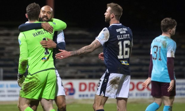 Dundee goalkeeper Jack Hamilton celebrates.