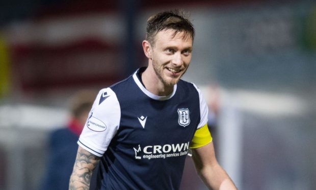 Dundee's Jordan McGhee at full time after beating Hearts.