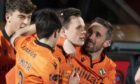 DUNDEE, SCOTLAND - JANUARY 12: Dundee United's Lawrence Shankland (centre) celebrates making it 2-2 during the Scottish Premiership match between Dundee United and St Johnstone at Tannadice Park on January 12, 2021, in Dundee, Scotland. (Photo by Ross Parker / SNS Group)