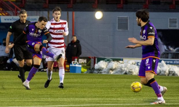 Lawrence Shankland fires just past the post.